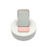 Small portable foldable mirror, lightweight, durable, and ideal for travel, touch-ups, and on-the-go beauty routines. Available in pink and cream color.