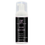 Lola's Beauty Treasure Bottle of lightweight hair mousse for defining curls and controlling frizz
