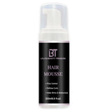 Lola's Beauty Treasure Bottle of lightweight hair mousse for defining curls and controlling frizz